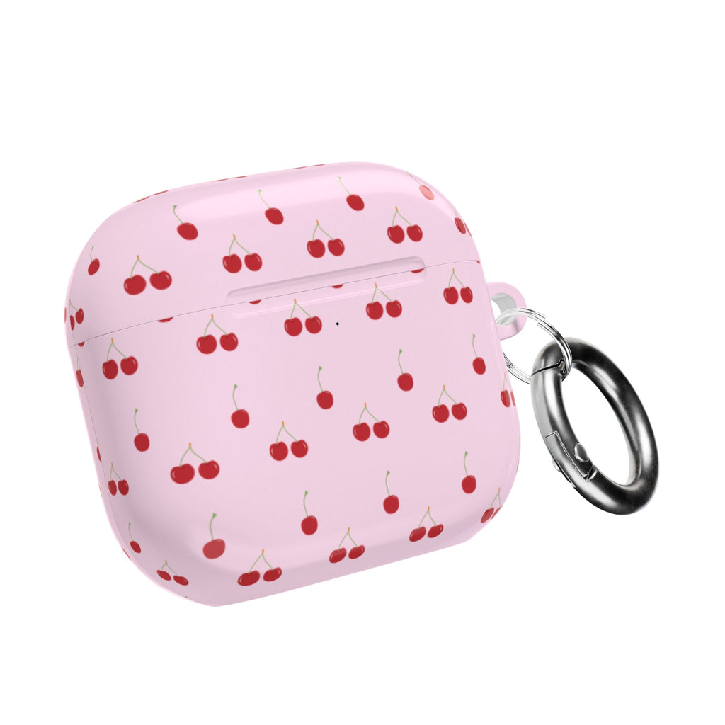 Baby pink AirPods case with cherry pattern and metal keyring, closed