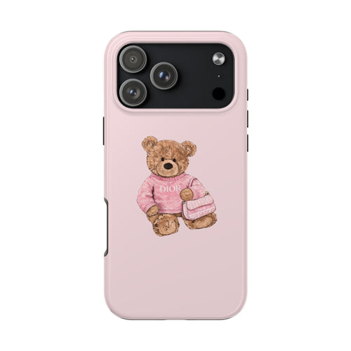 Baby pink phone case with teddy bear graphic in pink sweater and bag charm