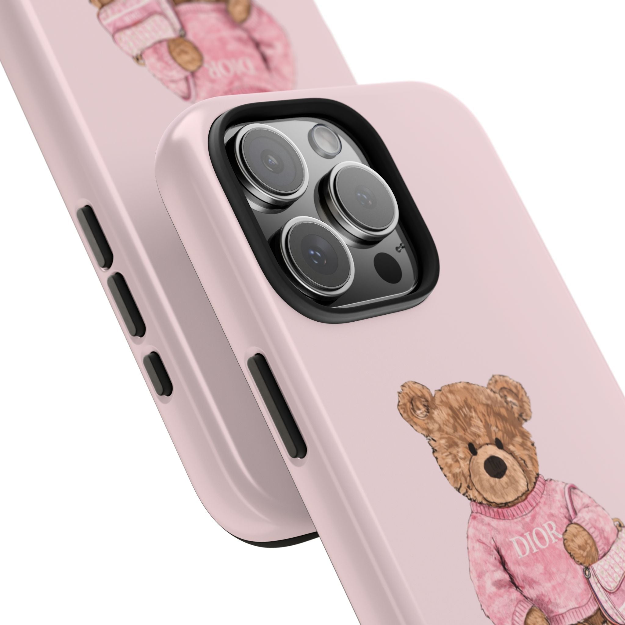 Angled light pink phone case showing camera cutouts and teddy bear design on back