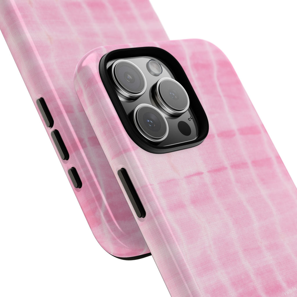 Pink shibori tie-dye phone case angled view with side button cutouts