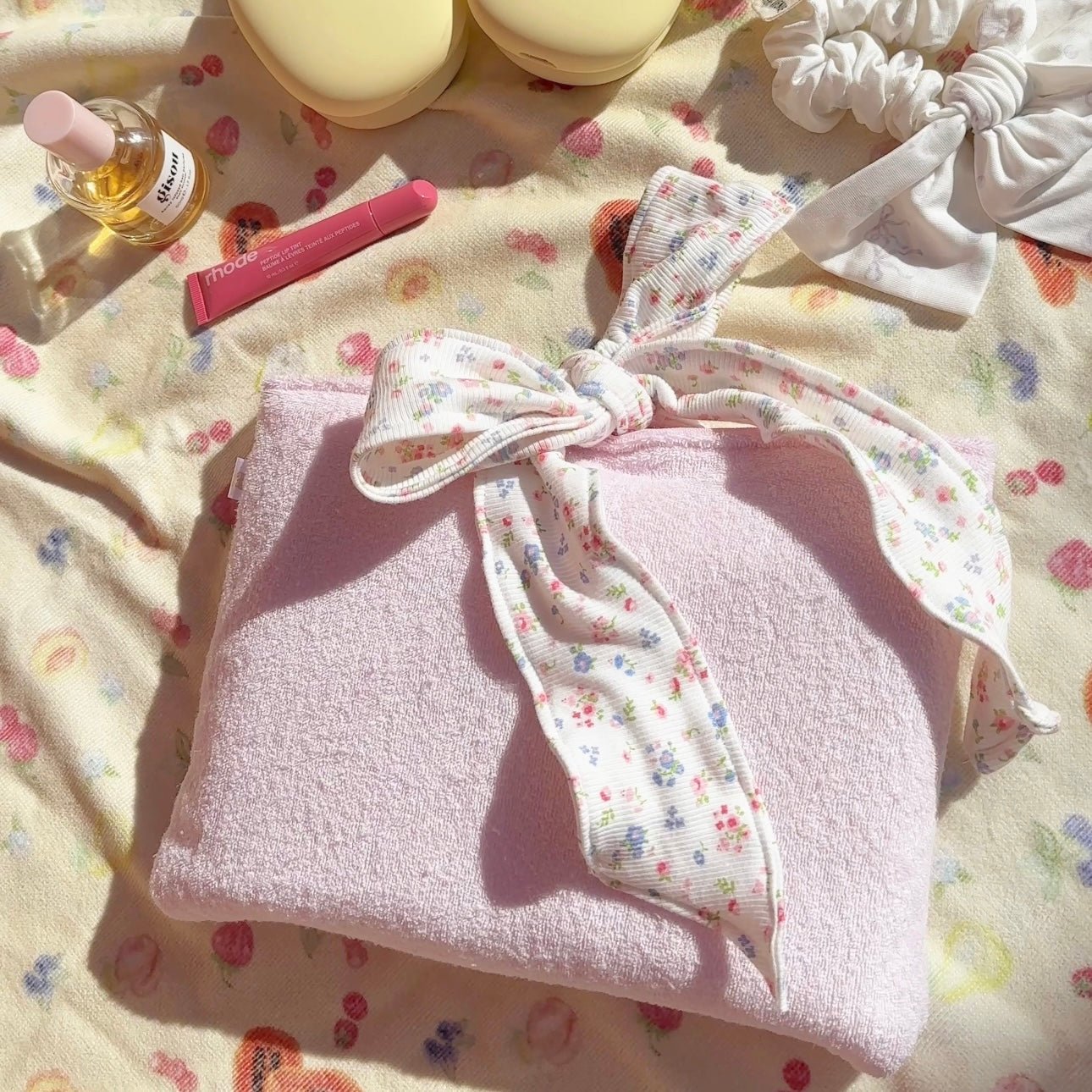Baby pink teddy bow Bible sleeve with white floral ribbon tie and drawstring opening