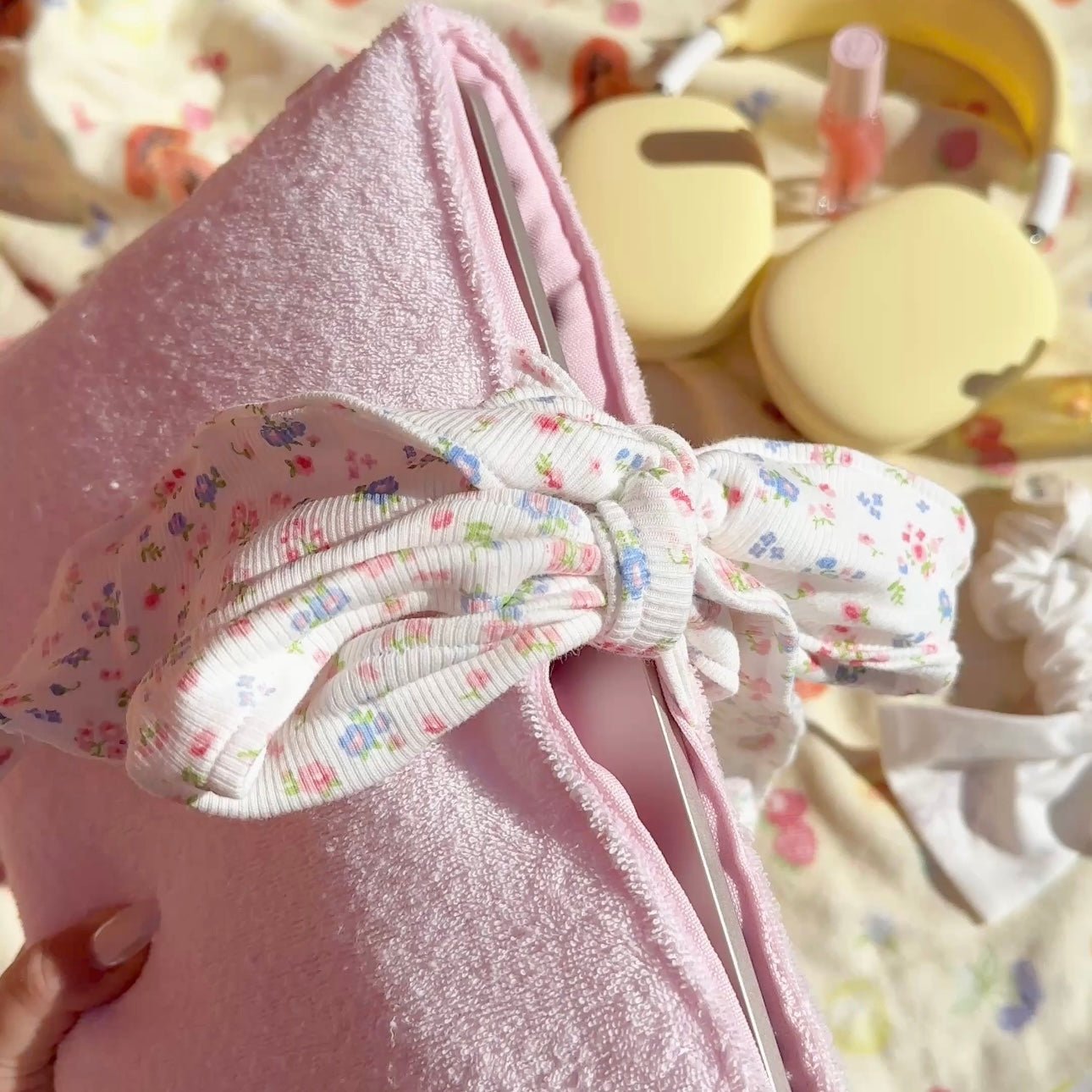 Pink teddy Bible sleeve with gathered floral fabric bow at neckline and drawstring