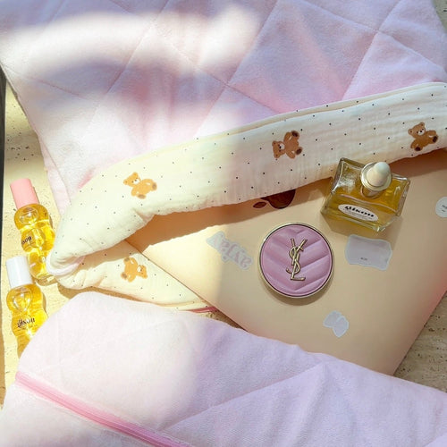 Baby pink terrycloth teddy bear fabric with polka dot pattern and bear motifs