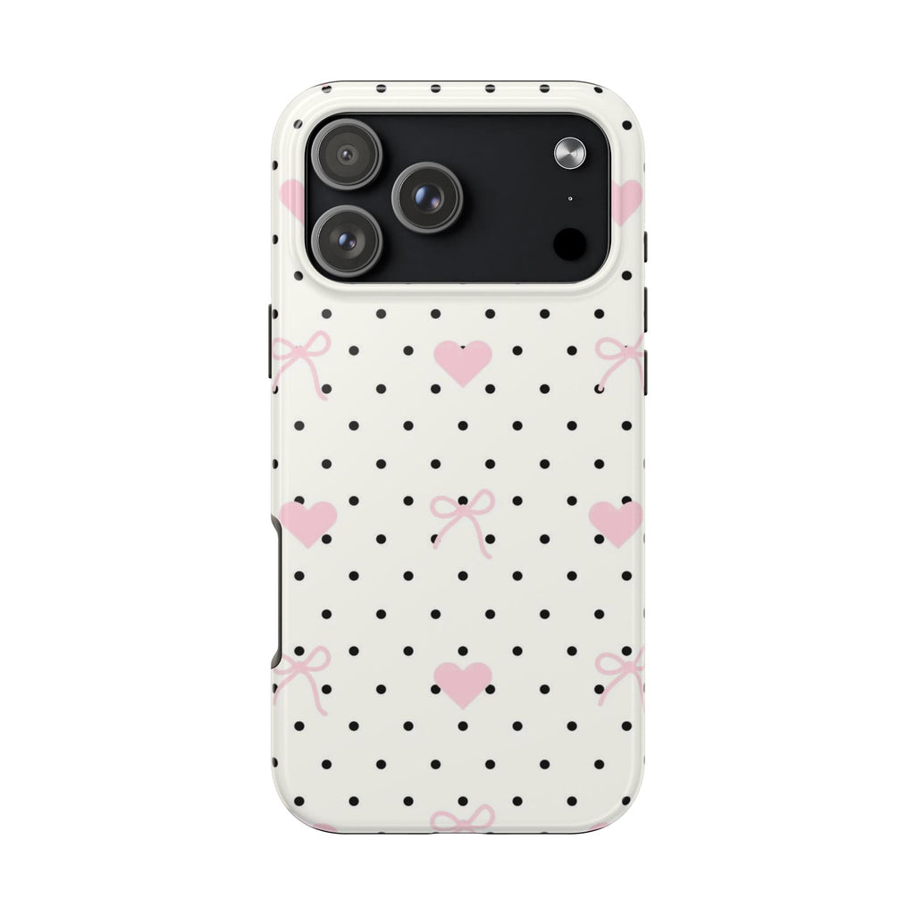 White phone case back with black polka dots, pink hearts and bow details