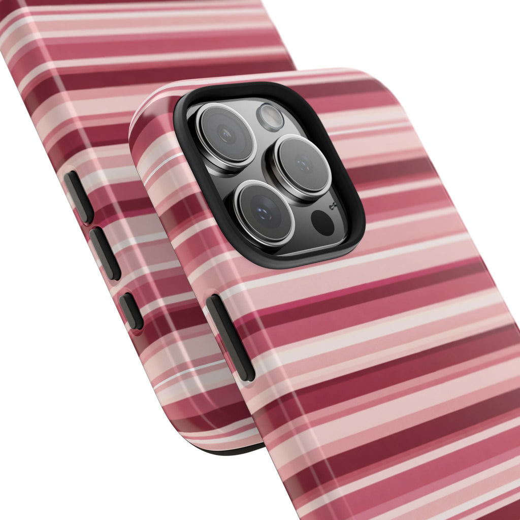 Blush and rose horizontal stripe phone case, angled view showing camera lenses