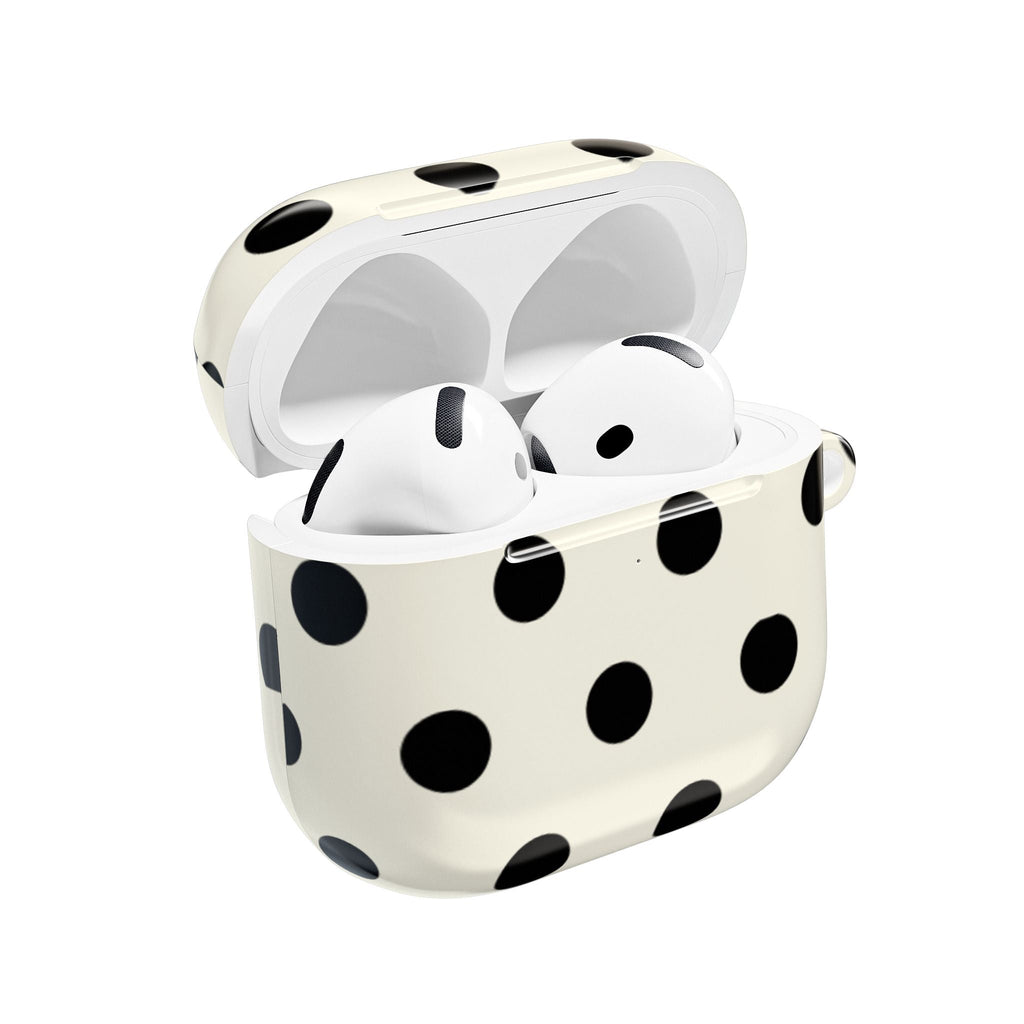 Beige AirPods case with black polka dots, open lid and visible earbuds