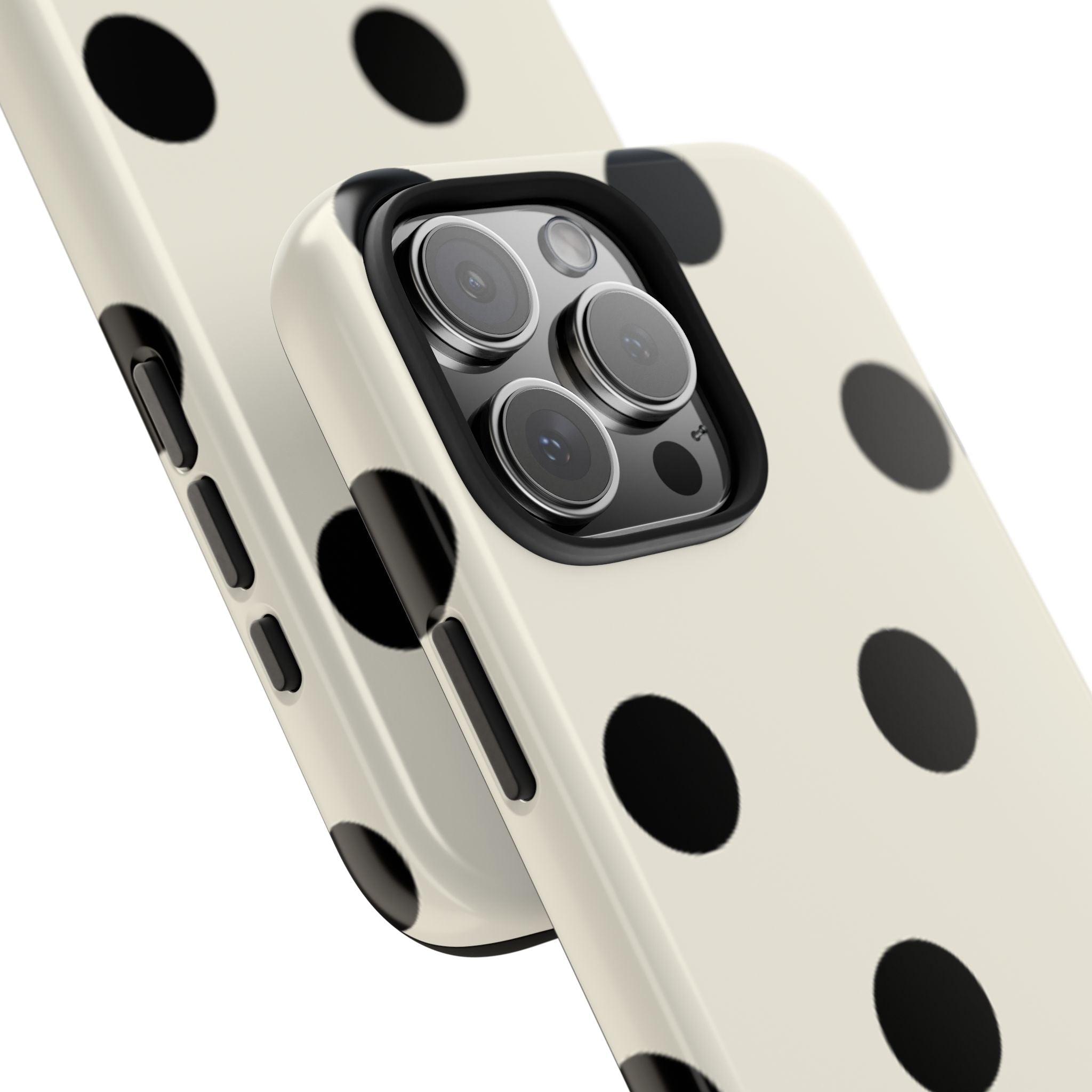 Beige polka dot phone case close-up, camera lenses and side button openings
