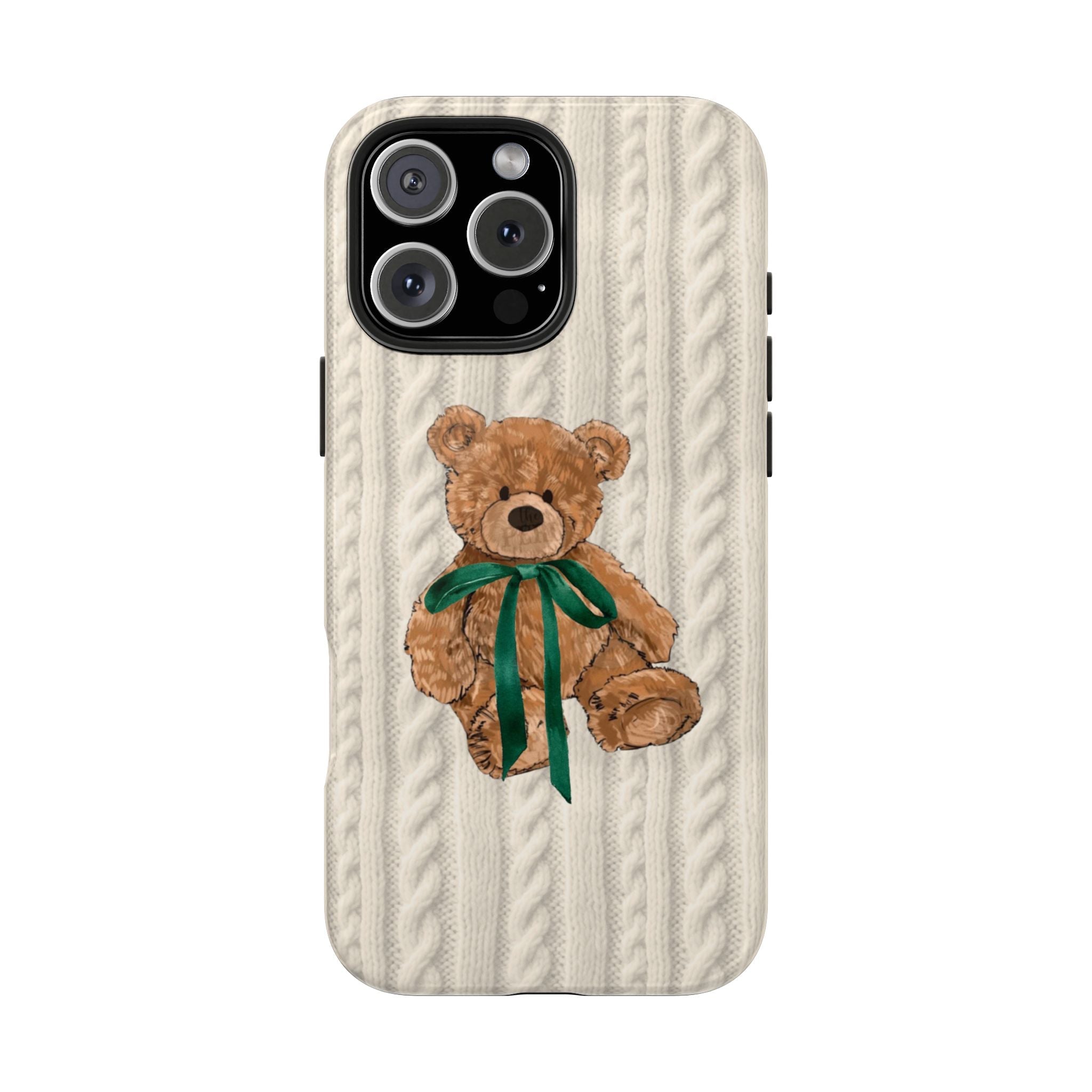 Cream cable-knit phone case with brown teddy and long green ribbon bow