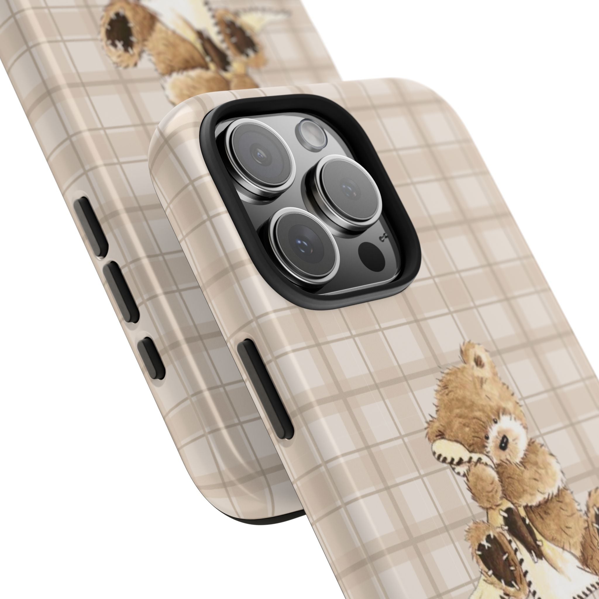 Angled view of beige plaid teddy bear phone case with raised camera lens frames