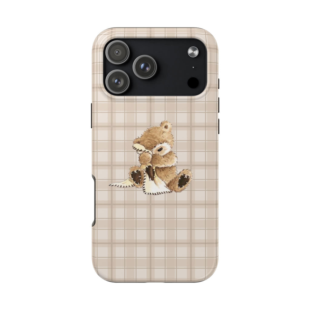 Beige plaid phone case featuring small teddy bear near center, with camera cutout
