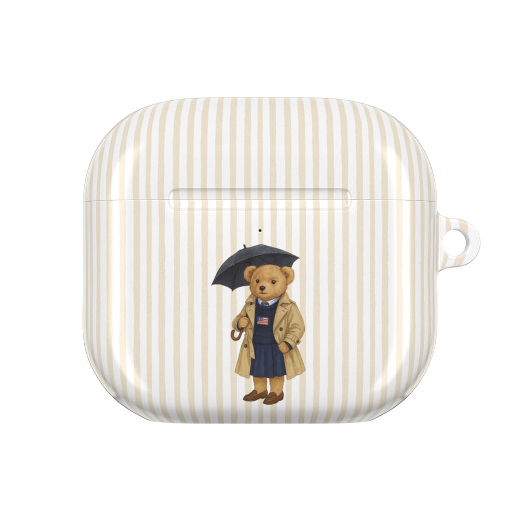 Beige striped AirPods case with centered teddy bear graduation artwork