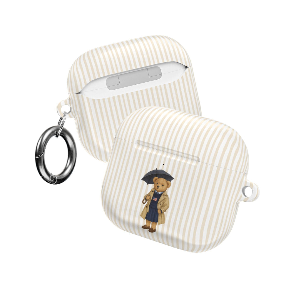 Beige striped AirPods case with teddy bear graduation graphic and keyring