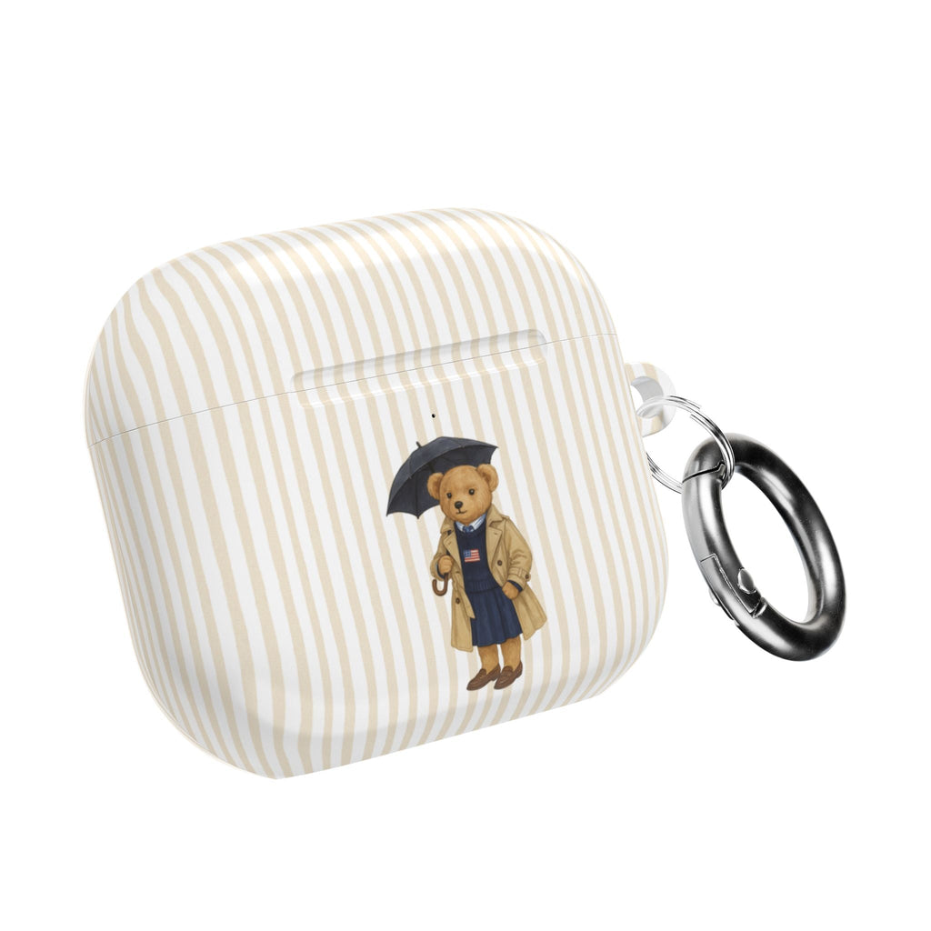 Beige striped AirPods case with teddy bear graduation graphic and metal key clip