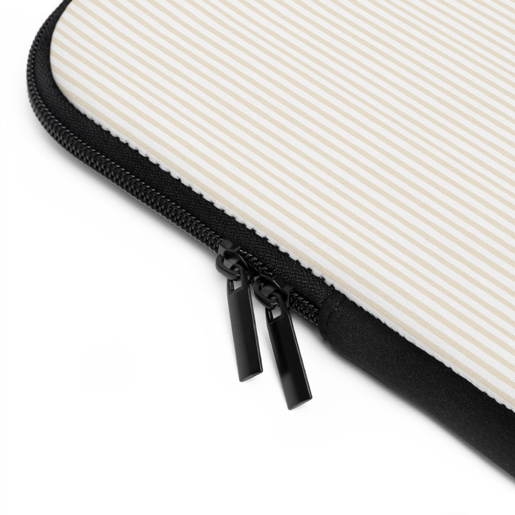 Beige striped neoprene sleeve close-up of black zipper and piping