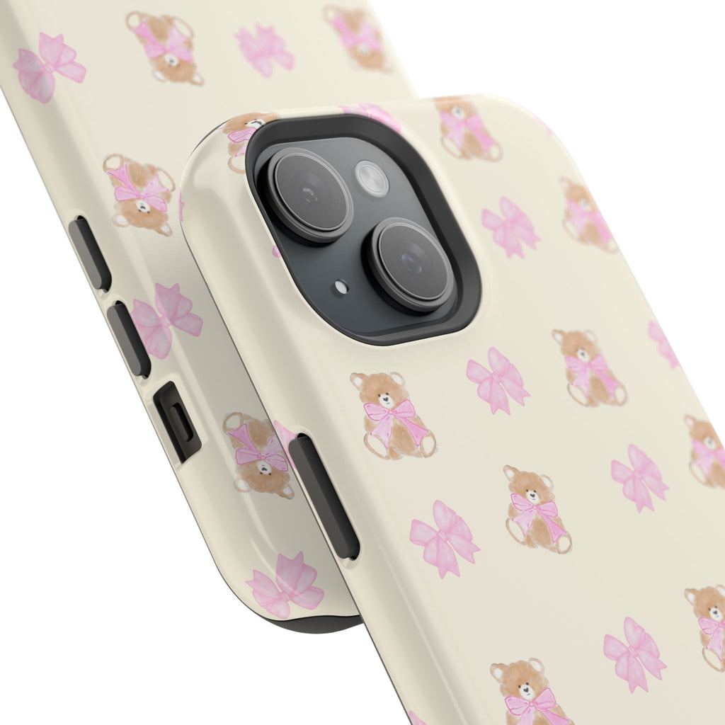 Beige teddy-bear phone case with pink bows pattern and raised camera cutout