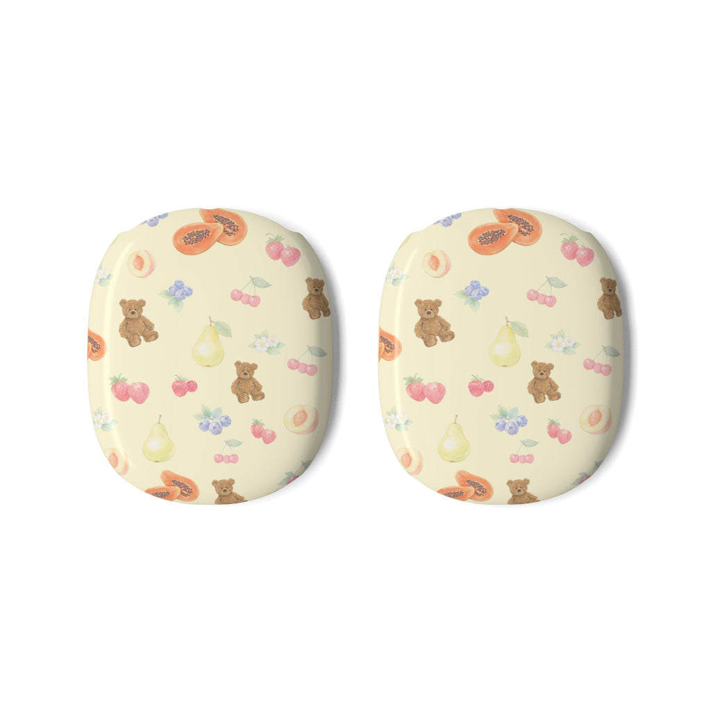 Two cream ear cover pads with cute bears, berries, and fruit icons pattern