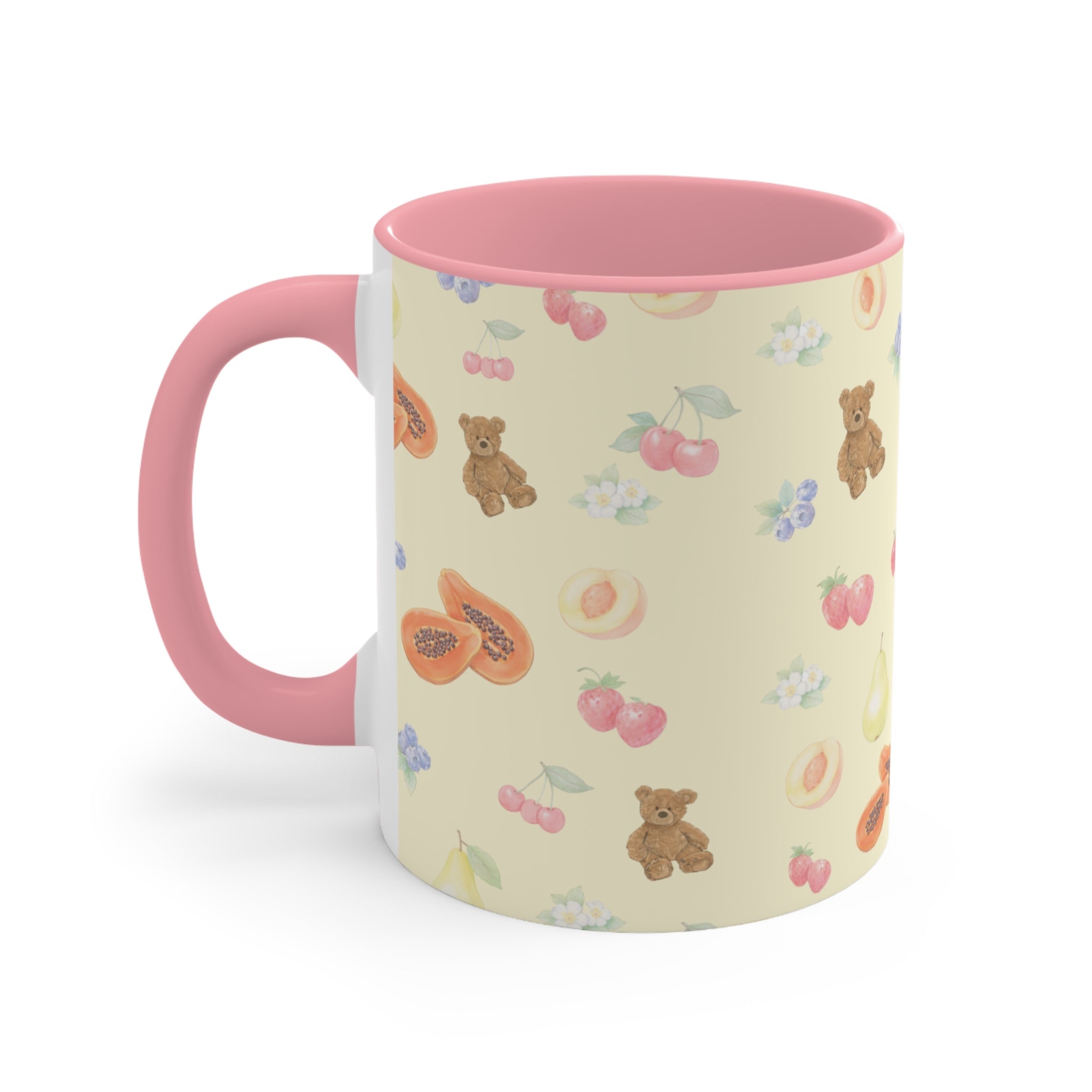 Berry Bears ceramic mug, pink handle and rim; pale yellow with bear, pear, and berry graphics