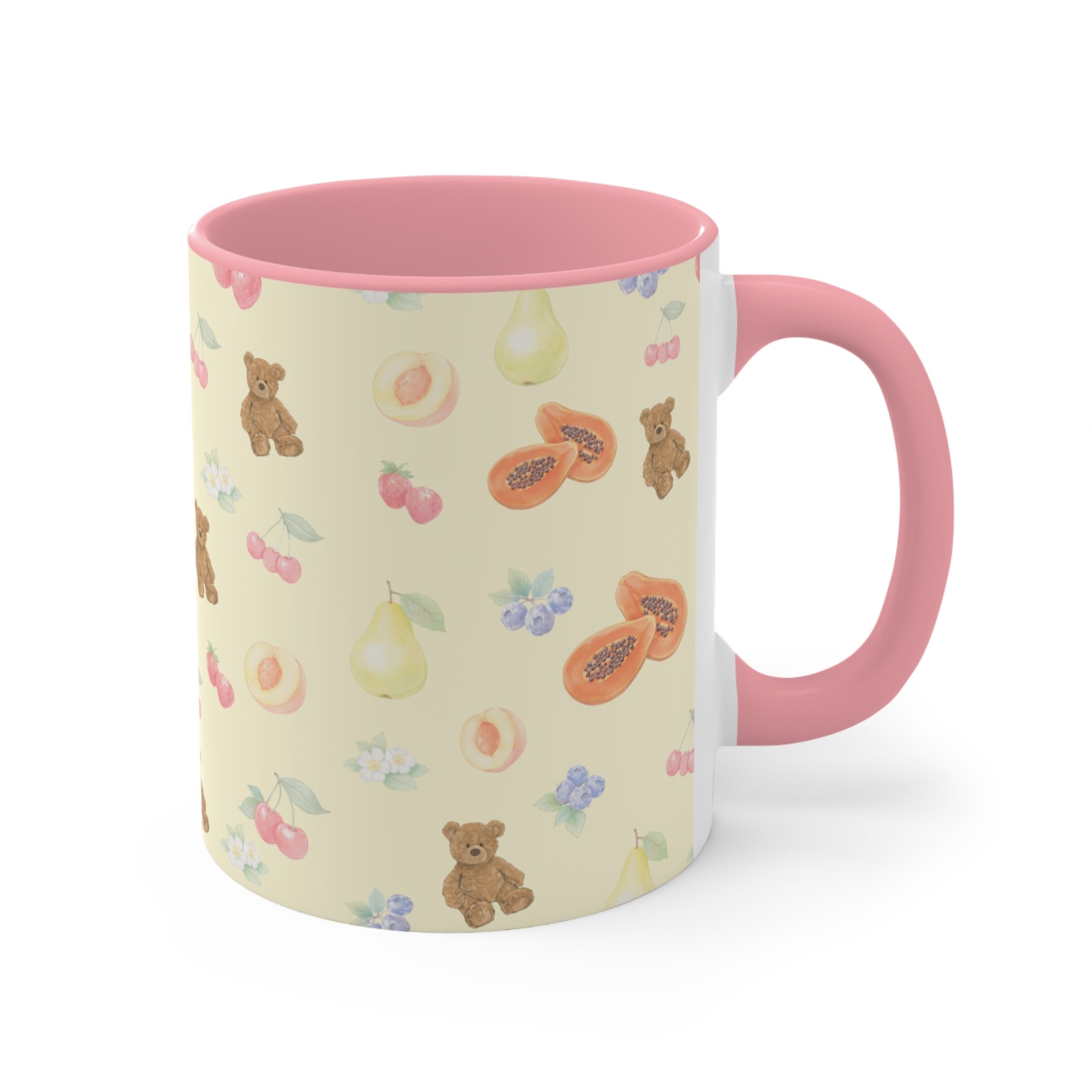 Berry Bears ceramic mug with pink interior and handle; pale yellow print of bears and fruit