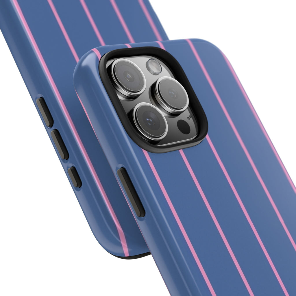 Angled view of blue phone case with berry-pink vertical stripes and triple camera cutout