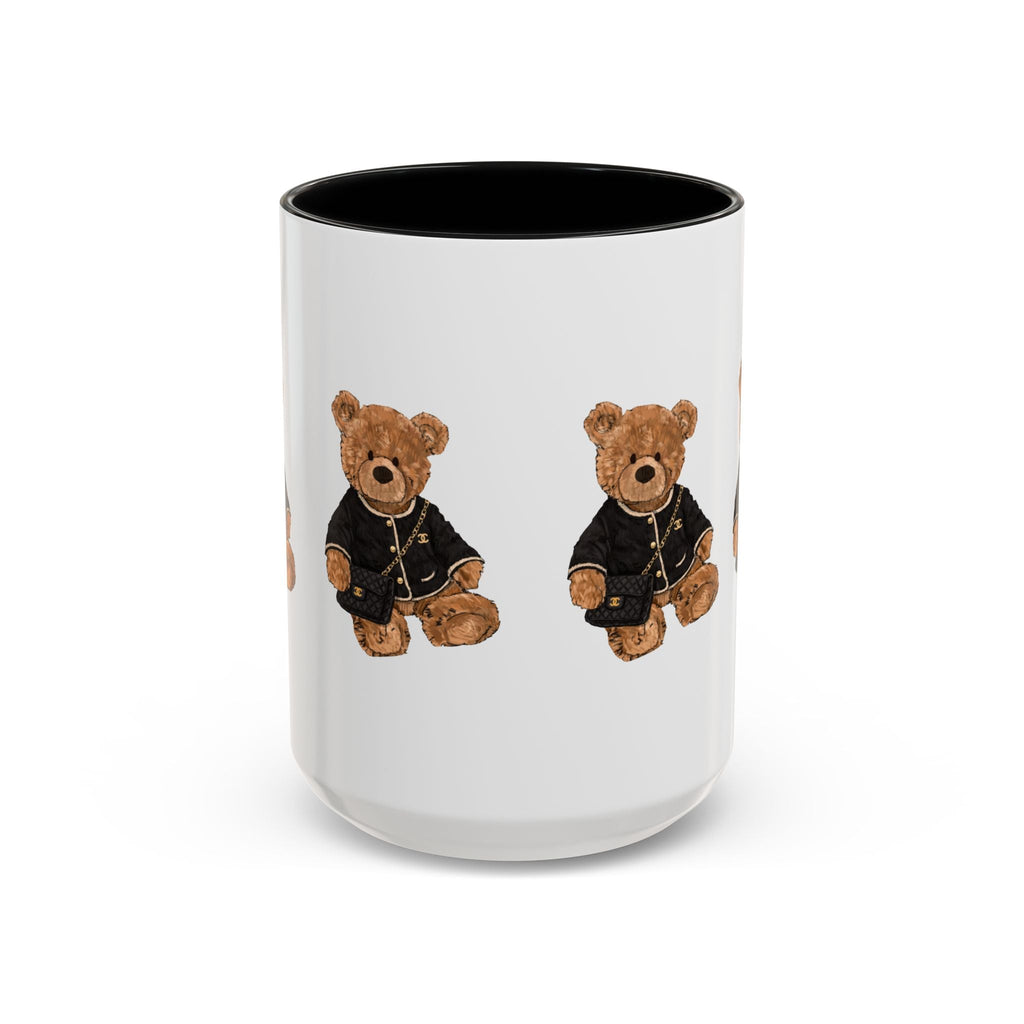White mug, black interior; two teddy bear figures in dark outfits on front