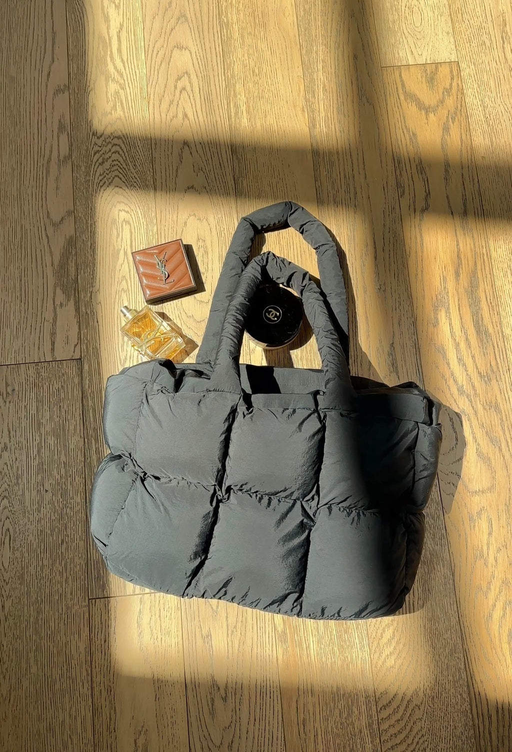 Black Cloud puffer duffle tote bag, quilted dark gray with wide handles