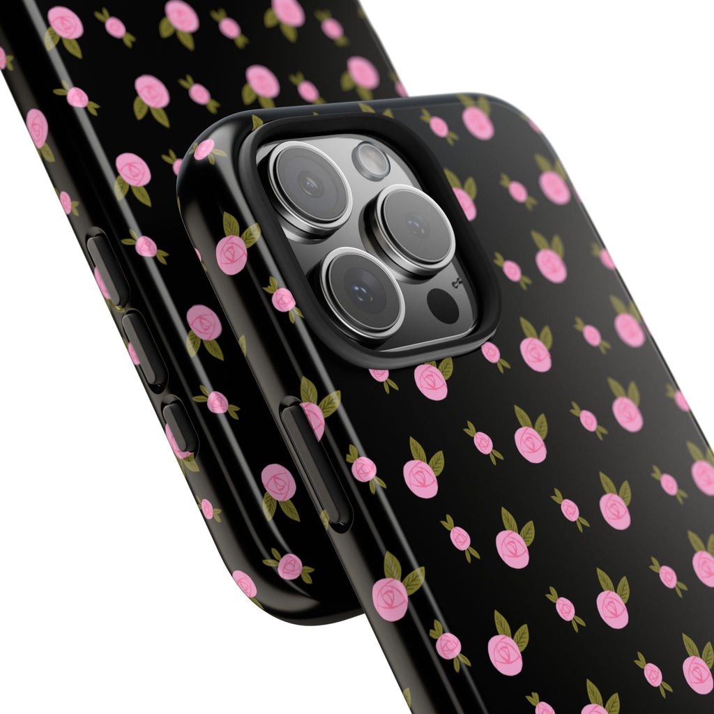 Black floral phone case with pink ditsy pattern and raised camera lens edges