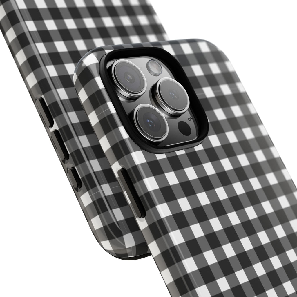 Black-and-white checkered phone case angled view with camera lens cover