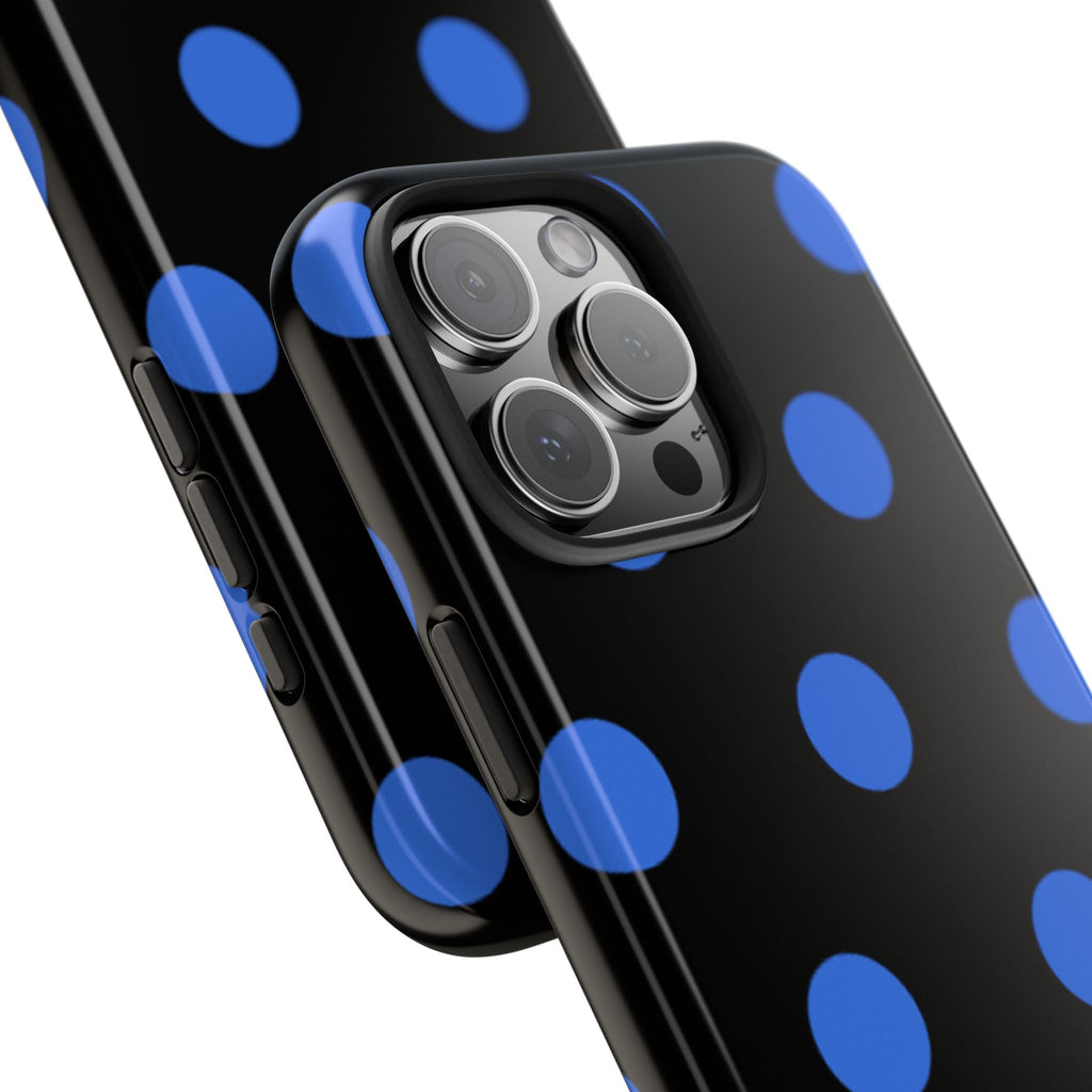 Black polka dot phone case with royal blue dots and raised camera ring details