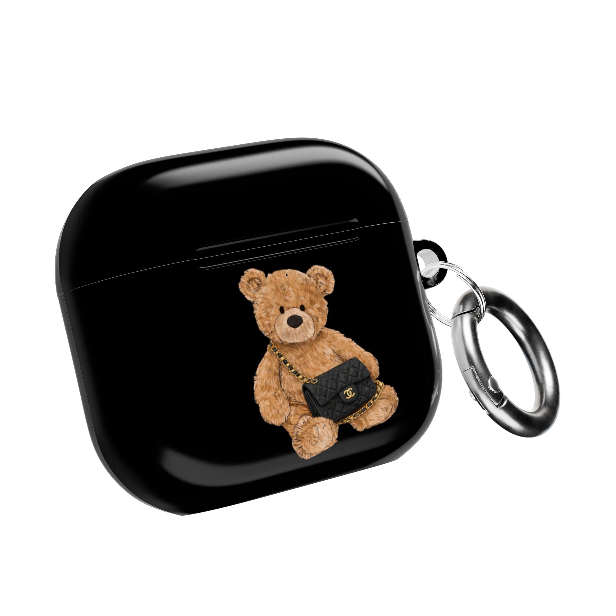 Black flap AirPods case with teddy bear patch and metal key ring, closed