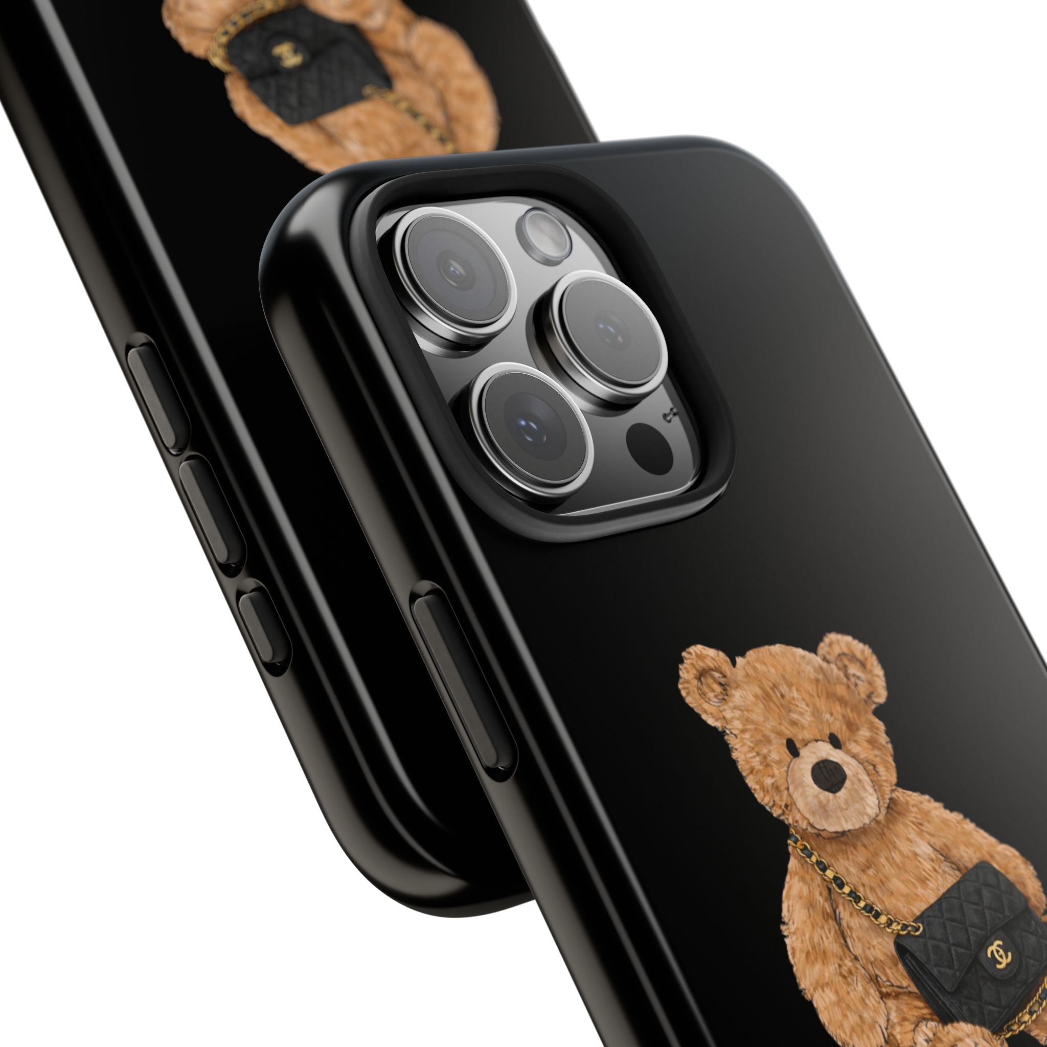 Side view black phone case with teddy bear graphic and small flap bag detail