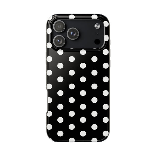 Black phone case with white polka dots; camera cutouts and raised camera rim