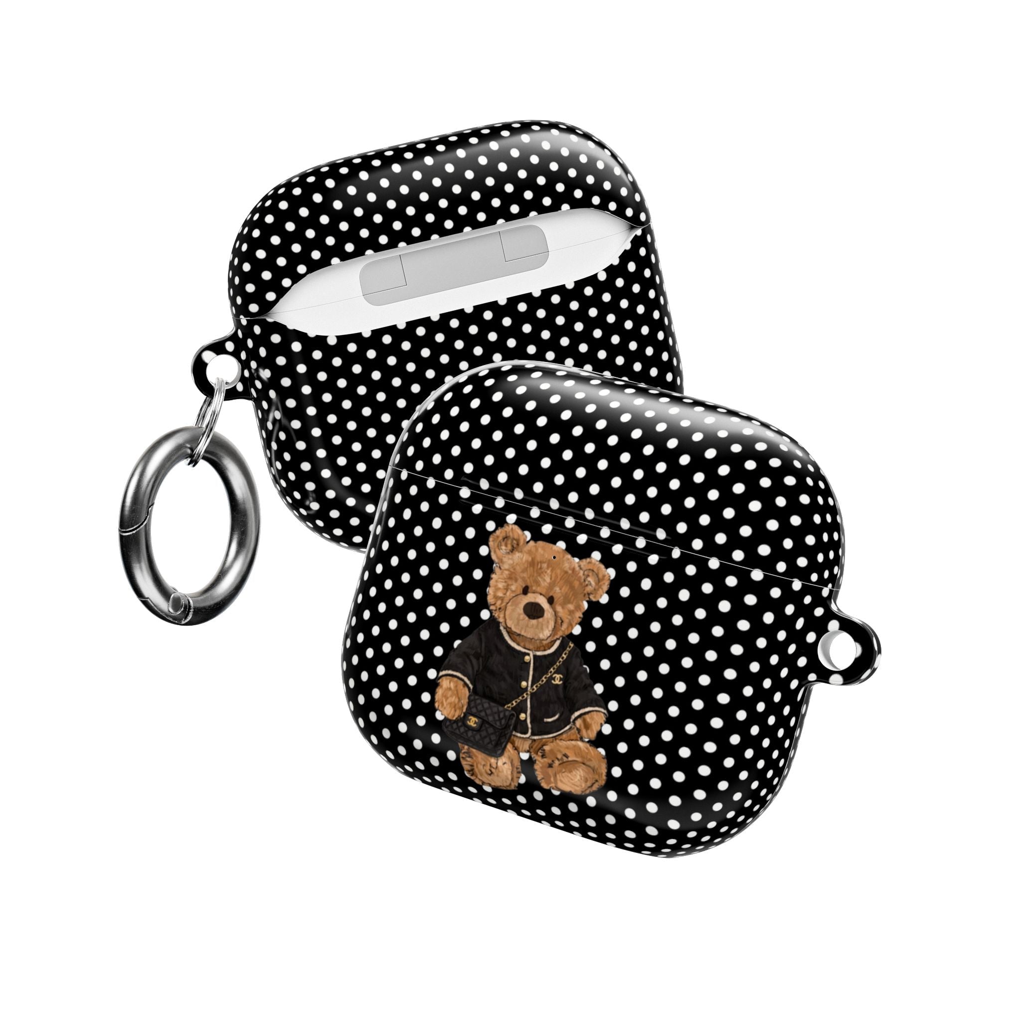 Black-and-white polka dot AirPods case with teddy bear design and keychain ring
