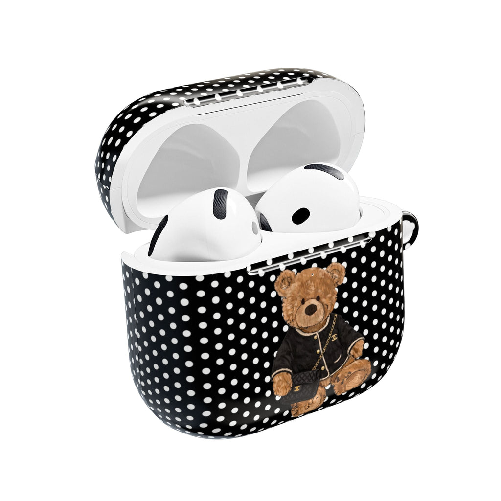 Polka dot AirPods case with teddy bear patch, black shell and open lid