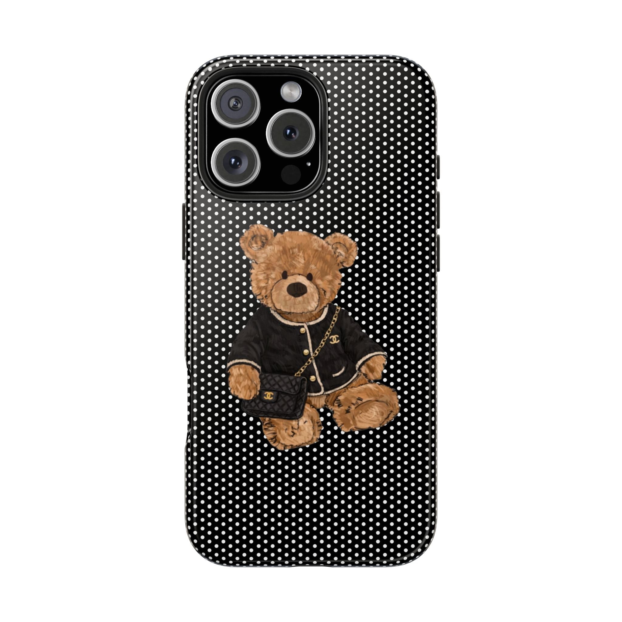 Black case with white polka dots, teddy bear in jacket holding mini purse