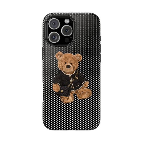 Black case with white polka dots, teddy bear in jacket holding mini purse