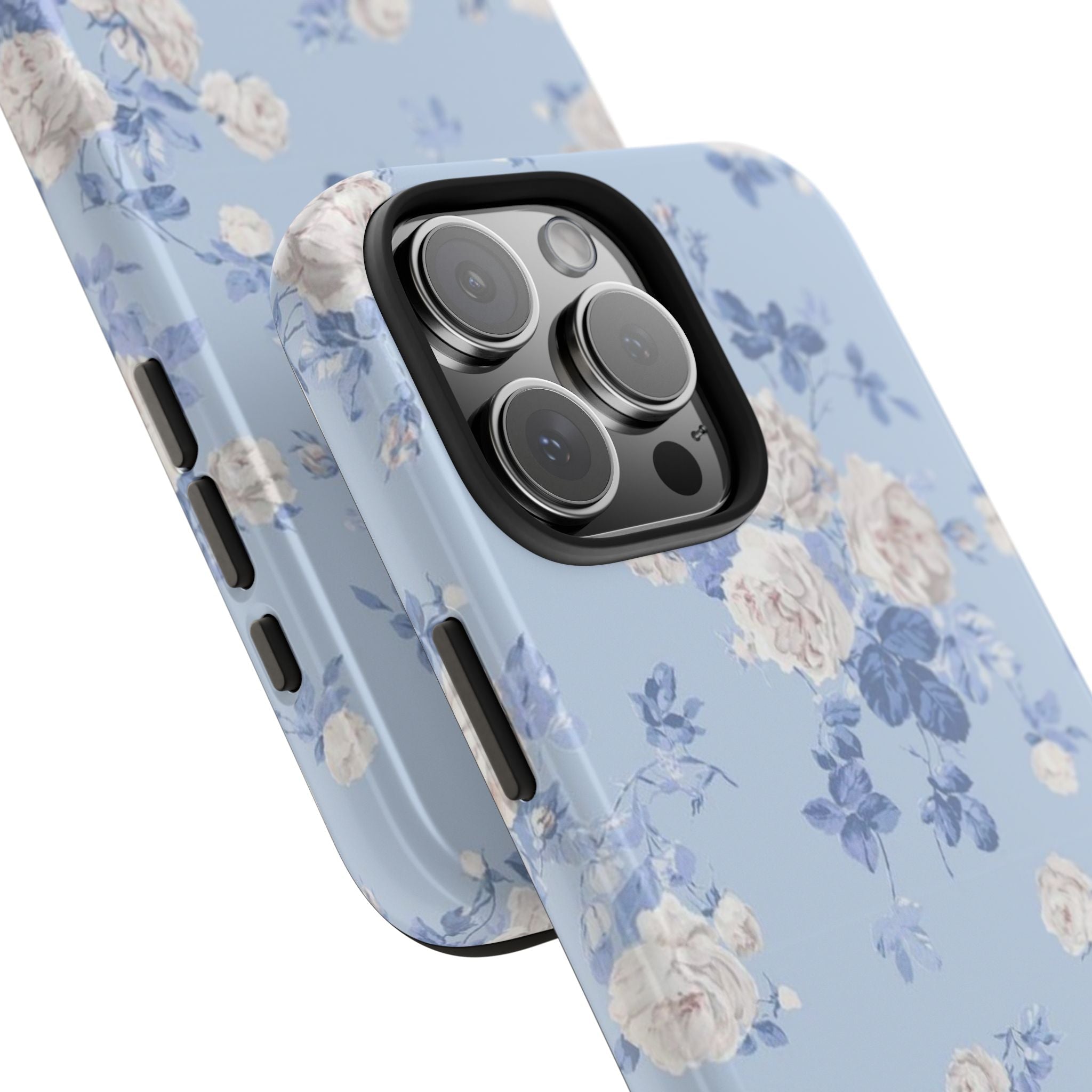Light blue floral phone case angled view with rose-and-blue print, raised camera bump