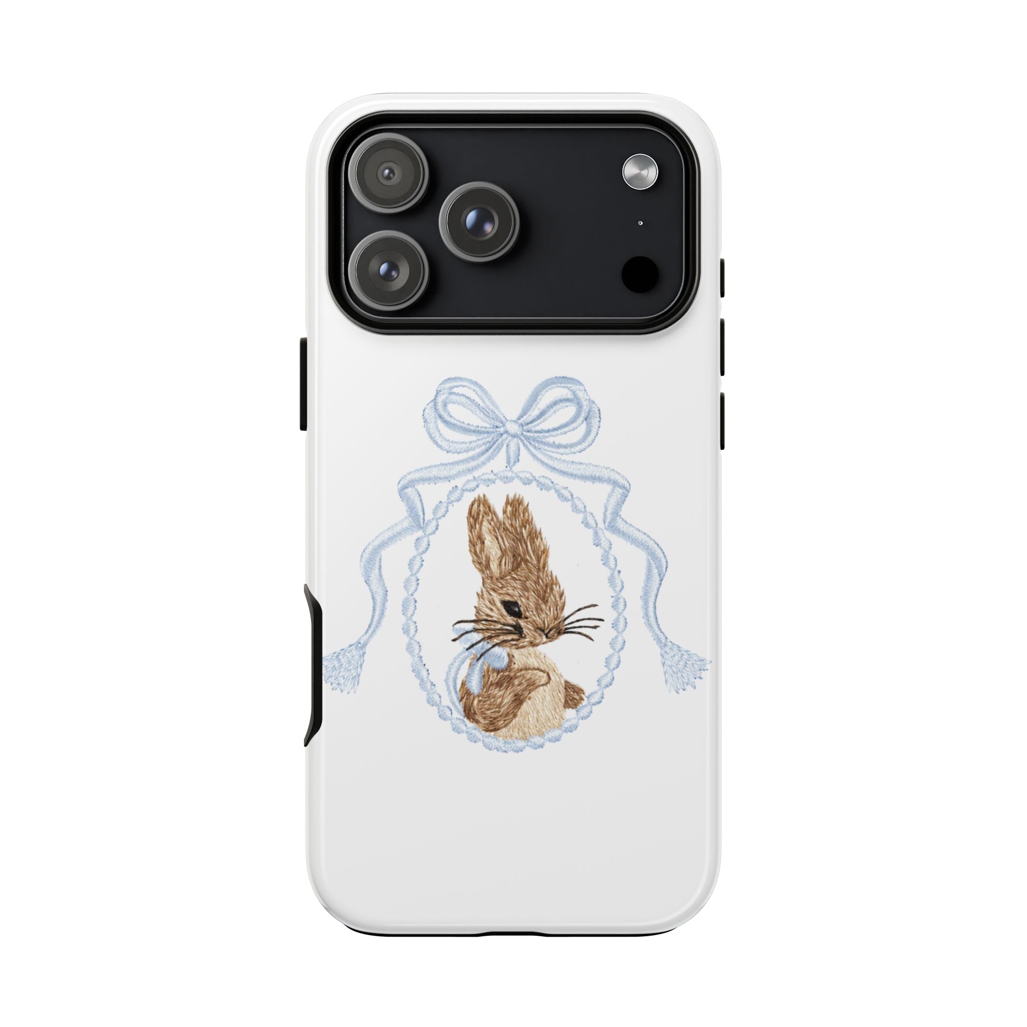 White phone case back with blue bow and bunny wreath graphic beneath the camera cutouts