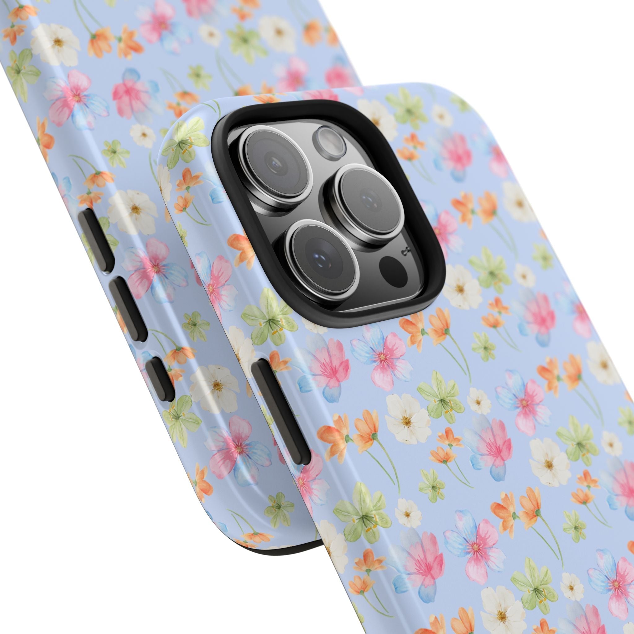 Blue multicolor floral phone case shown in angled view, raised camera bump and side grip