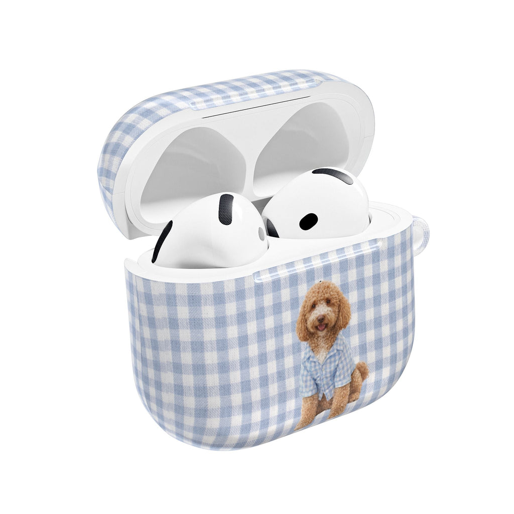 Blue gingham AirPods case with open lid and dog applique, showing earbuds