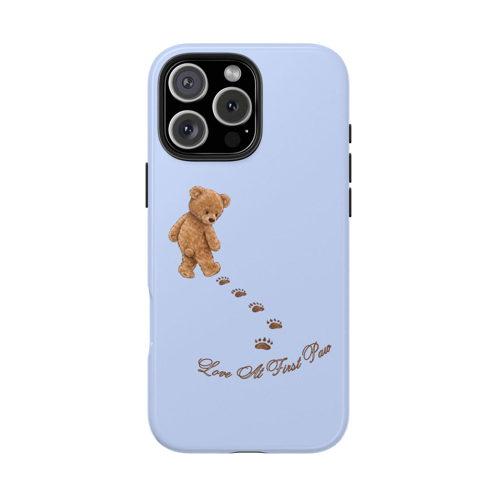 Light blue rear phone case with teddy bear, paw prints, and “Love at First Paw” text