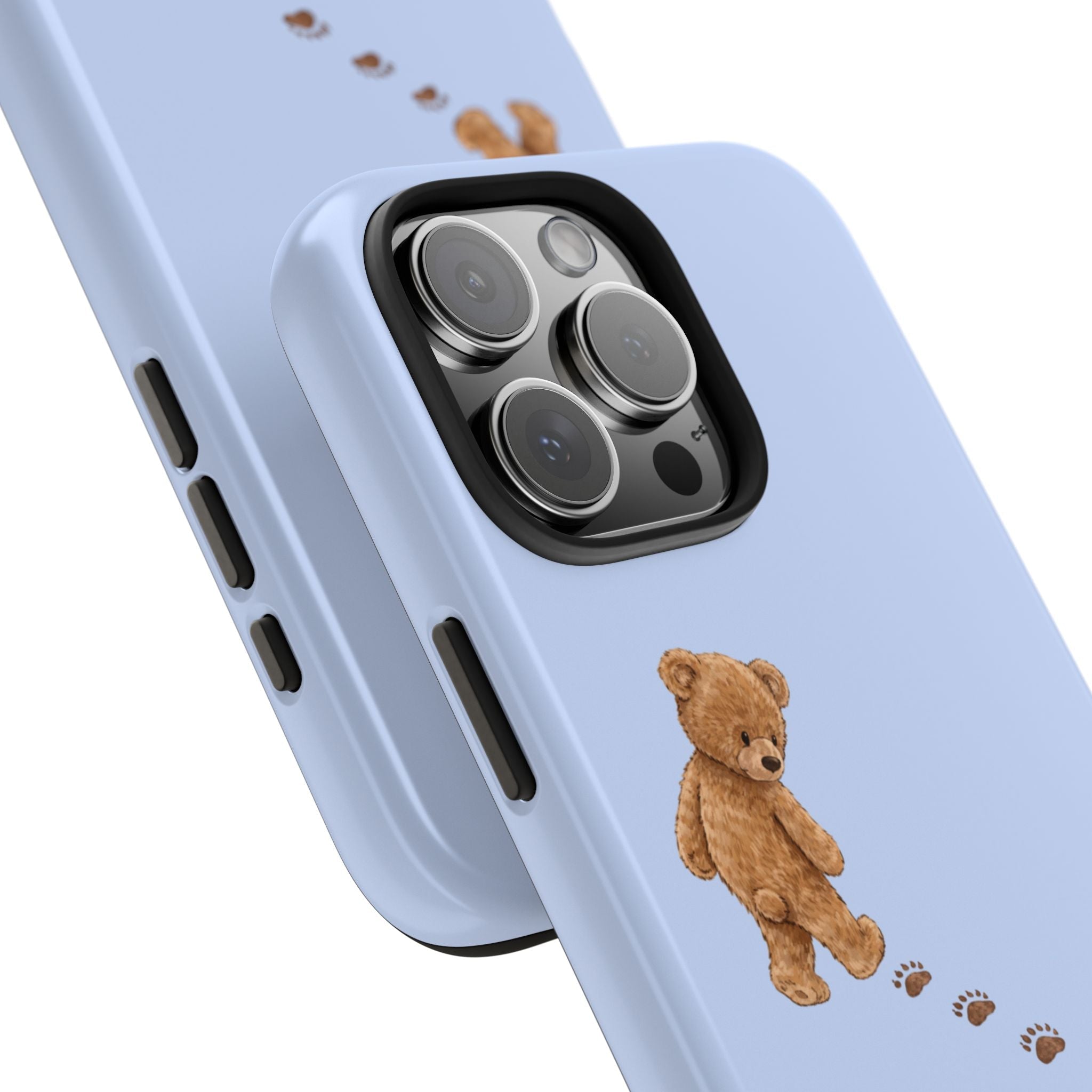Light blue phone case corner with teddy bear and paw prints, side buttons cutouts visible