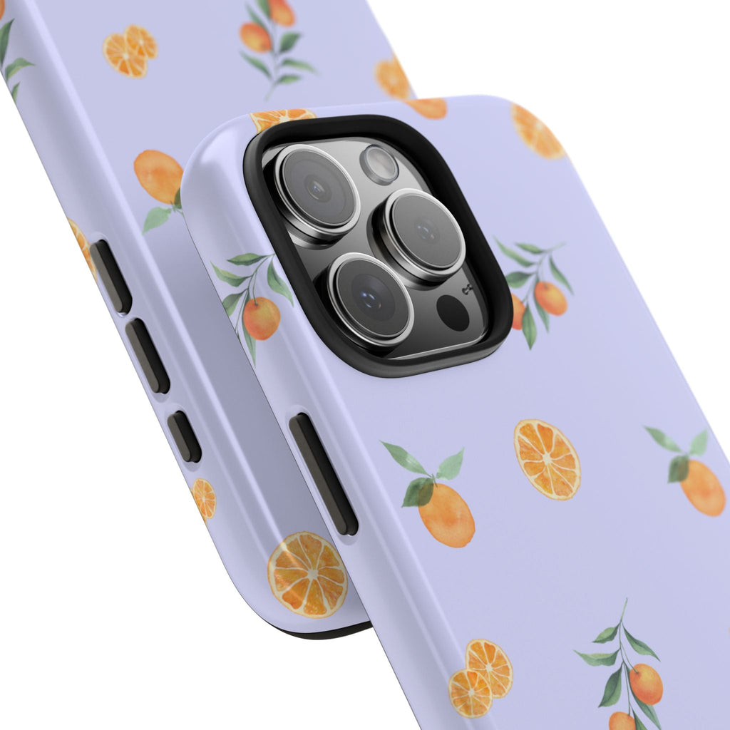 Close-up of lavender phone case edge and triple-lens camera bump with orange and lemon print