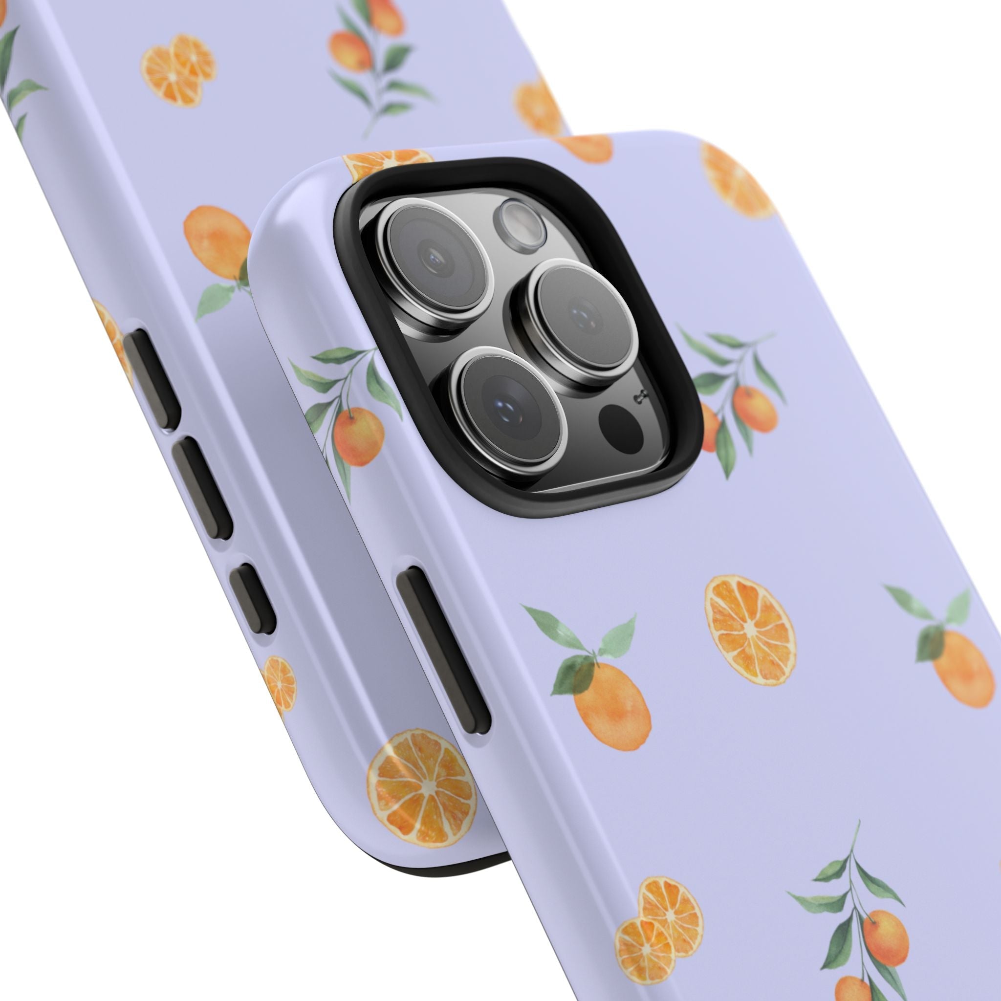 Close-up of lavender phone case edge and triple-lens camera bump with orange and lemon print