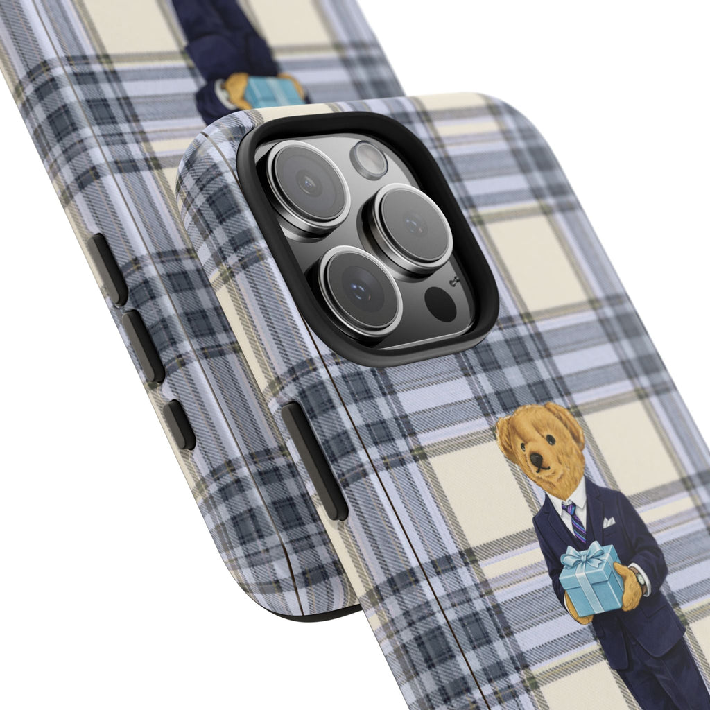 Angled blue plaid phone case with teddy bear holding a gift, raised lens covers