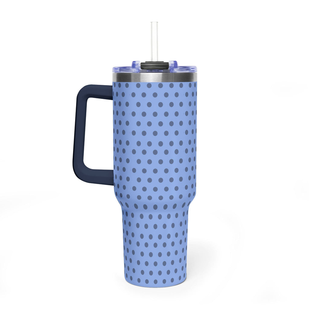 Blue stainless steel tumbler with gray polka dots and dark side handle