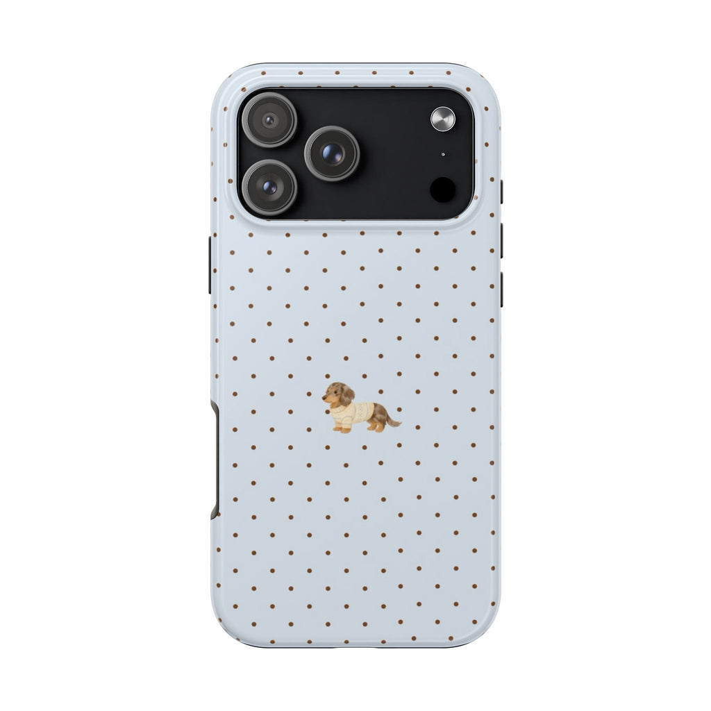 Two-tone phone case with dark camera panel, light blue polka dots, and dachshund puppy