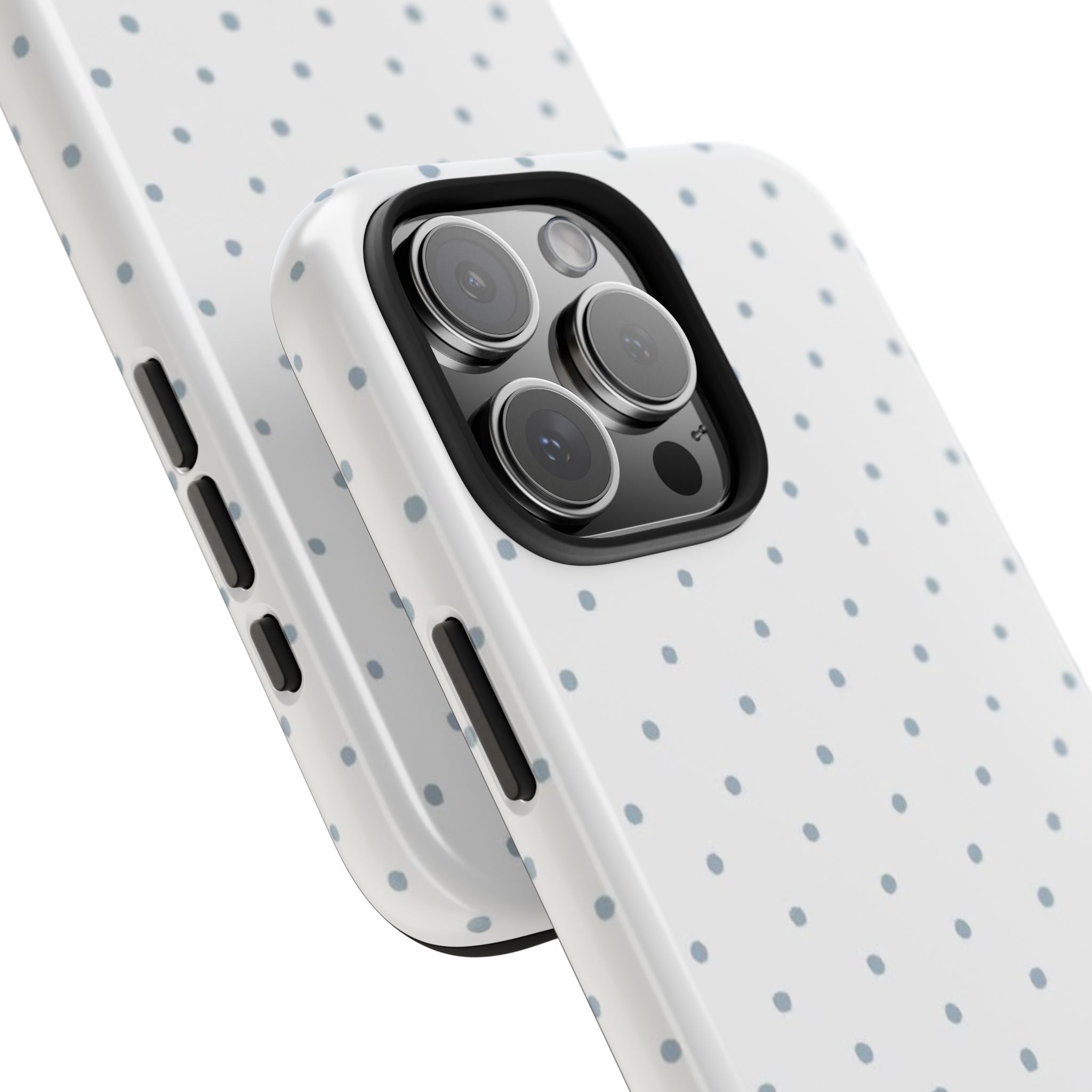 Close-up phone case with blue polka dot pattern and camera cutout