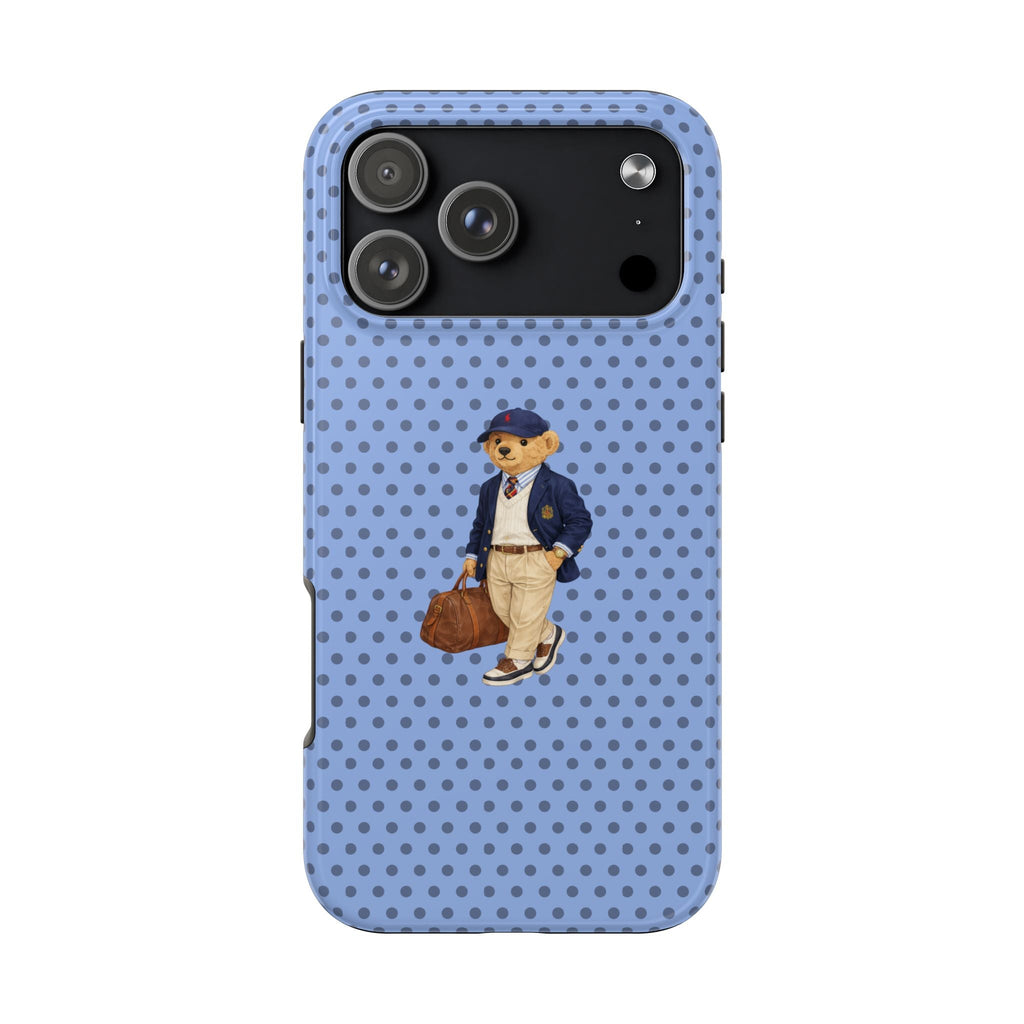 Blue polka dot phone case with teddy bear character in navy and beige outfit