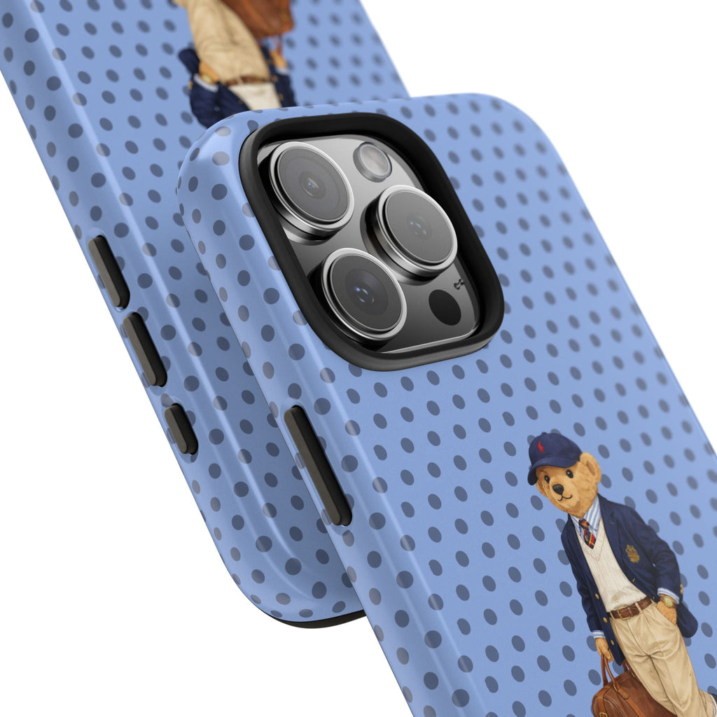 Blue polka dot phone case corner with teddy bear patch and raised camera lens