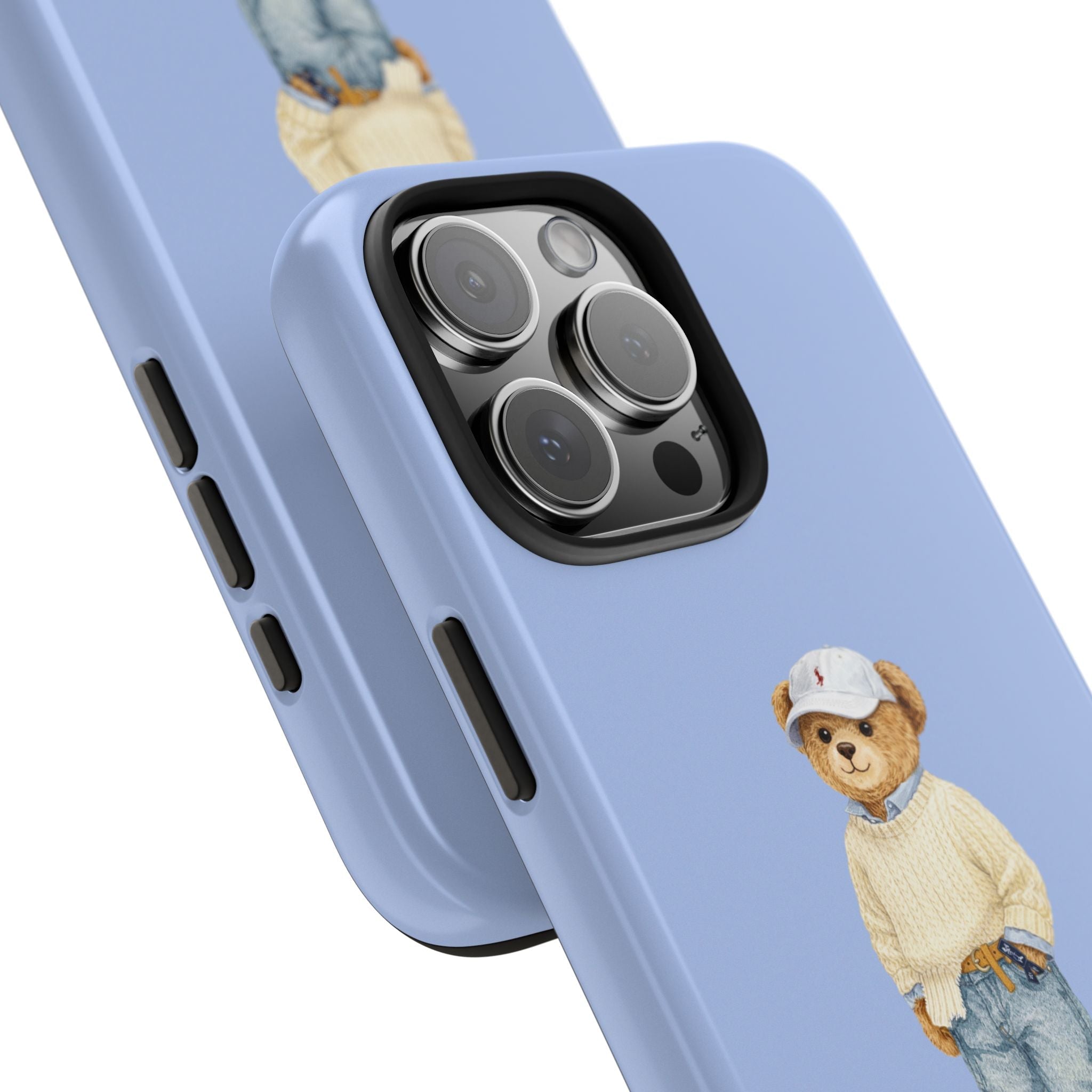 Light blue phone case with teddy bear figure and camera cutouts, angled view